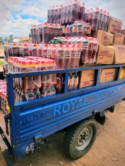 A tricycle loaded with Hizabrun Palm Oil ready for delivery